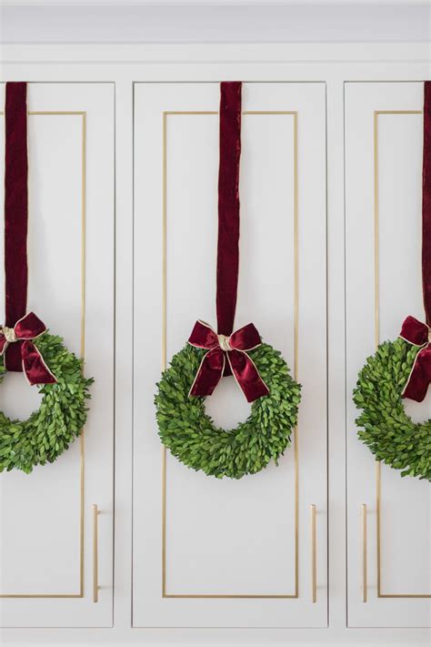 Enhance Your Cabinets with Stunning Wreaths for a Cozy and Festive Look - Shop Now!