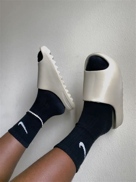 yeezy slides with nike socks pfp