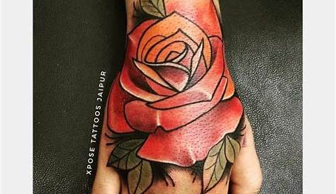 Hand tattoo with yellow rose