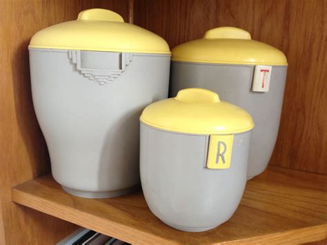 yellow and grey kitchen canisters