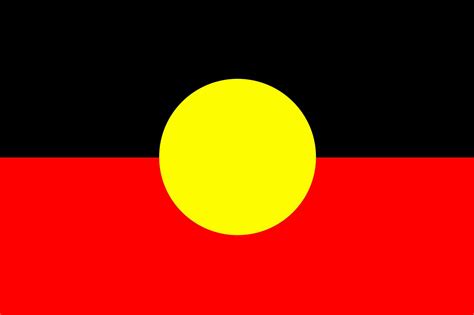 A close-up of the yellow circle on the Aboriginal flag