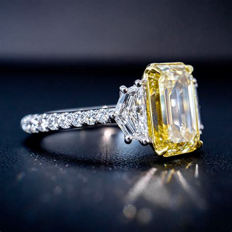 yellow emerald cut engagement rings