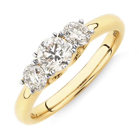 yellow gold 3 diamond engagement rings