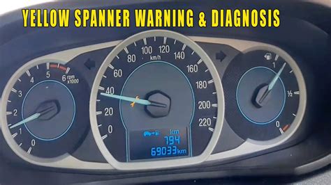 Yellow Warning Light With Spanner