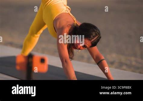 Yoga instructor with ocean view