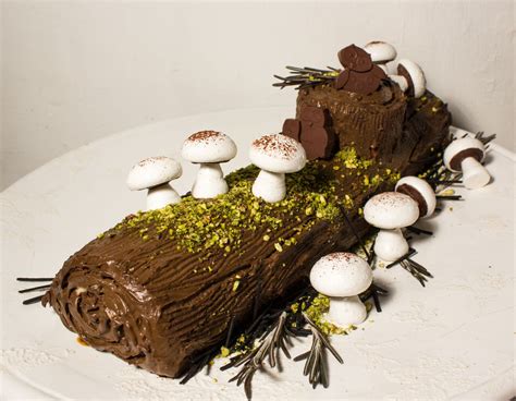 Christmas Yule Log Vanilla Cake with Chocolate Hazelnut Filling and